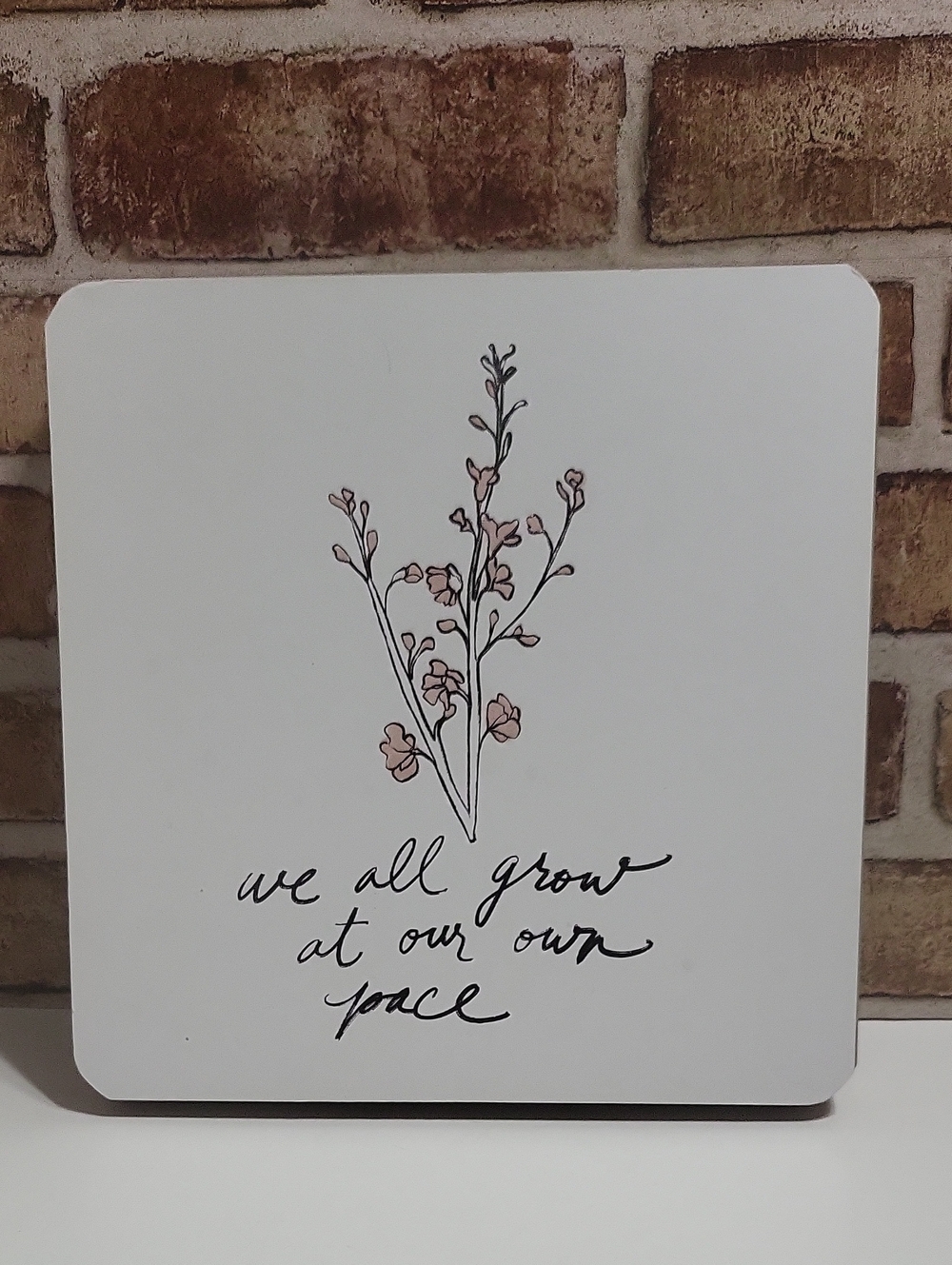 Floral "We All Grow At Our Own Pace" White Wall Art Sign